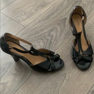 Black flirty T-strap heels
